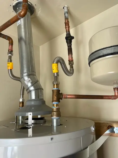 Water heater installation and plumbing repair in Lant